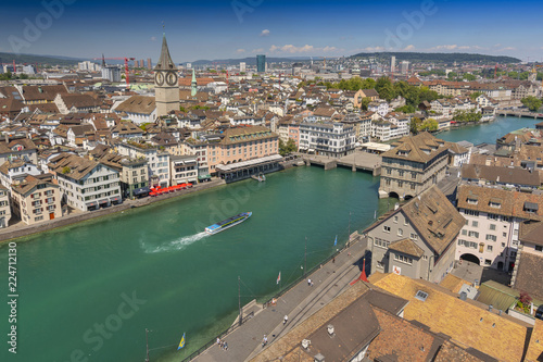 Aerial view of historic town centre of Zurich with the Muenster Bridge and Fraumuenster Church along Limmat river, Zurich, Switzerland.