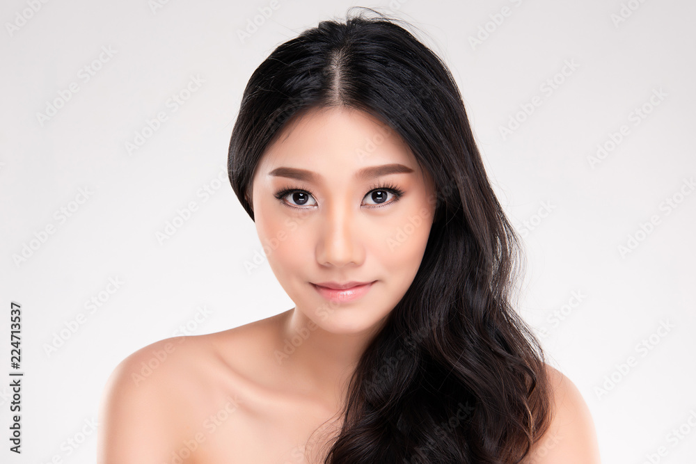 Young asian woman with clean skin of the face. Young asian woman with clean skin of the face.