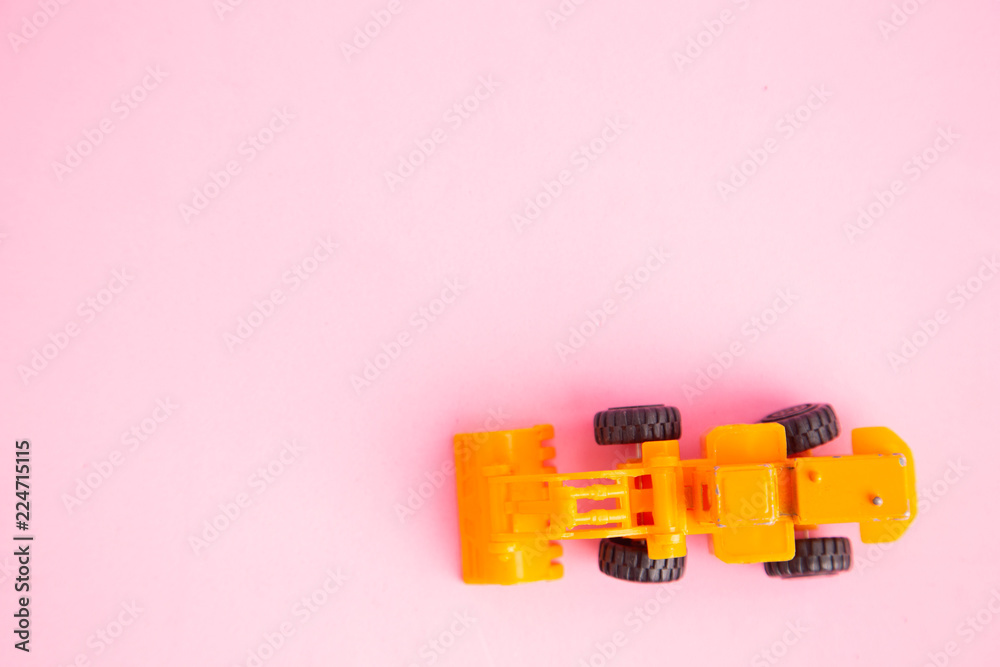 Obraz premium construction shovel toy in colorful background