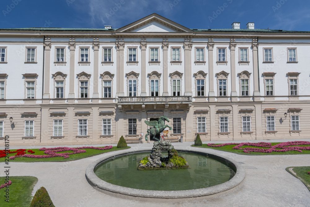 Obraz premium Facade of Schloss Mirabell Palace, with a bronze Pegasus on Pegasus Fountain in front, sculptor Kaspar Gras, Salzburg Austria.