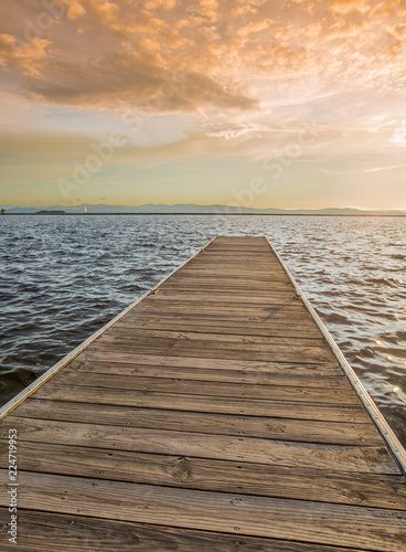 Fototapeta Naklejka Na Ścianę i Meble -  Wooden Harbor Eternity, sunset background