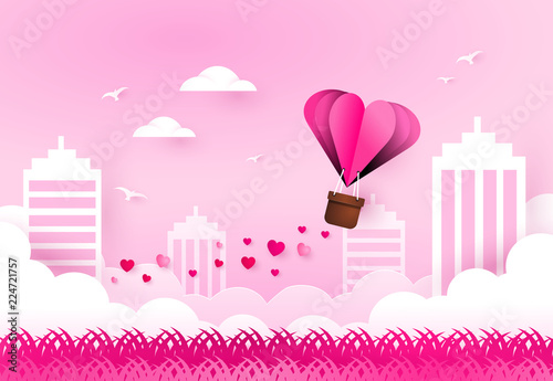 Heart air balloon over city. Love and valentines day. Paper art