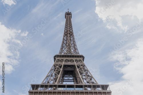 close up of Eiffel tower against cloudy sky