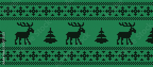 Seamless border. Knitted pattern with black deers and fir trees on a green background. Christmas background. Ornament. Vector illustration.
