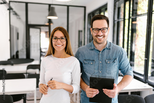 Portrait of a two casualy dressed entrepreneurs.