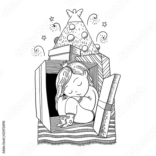 A Little baby girl with crown sleeps inside the gift box near the christmas tree.