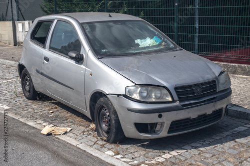 abandoned old car on the road