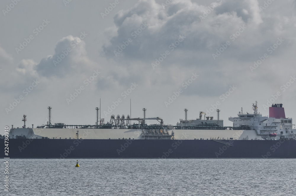 LNG TANKER - A large ship at the wharf of a gas terminal in Swinoujscie