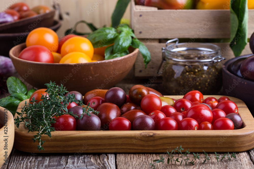 Colorful vegetables on rural wooden table, bell peppers, eggplants and tomatoes Colorful vegetables on rural wooden table, bell peppers, eggplants and tomatoes