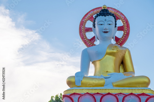 Pagoda stupa at Wat-Pratatdoikham (temple name), Chiangmai, Thailand - Buddha statue for praying and worship in Buddhist.