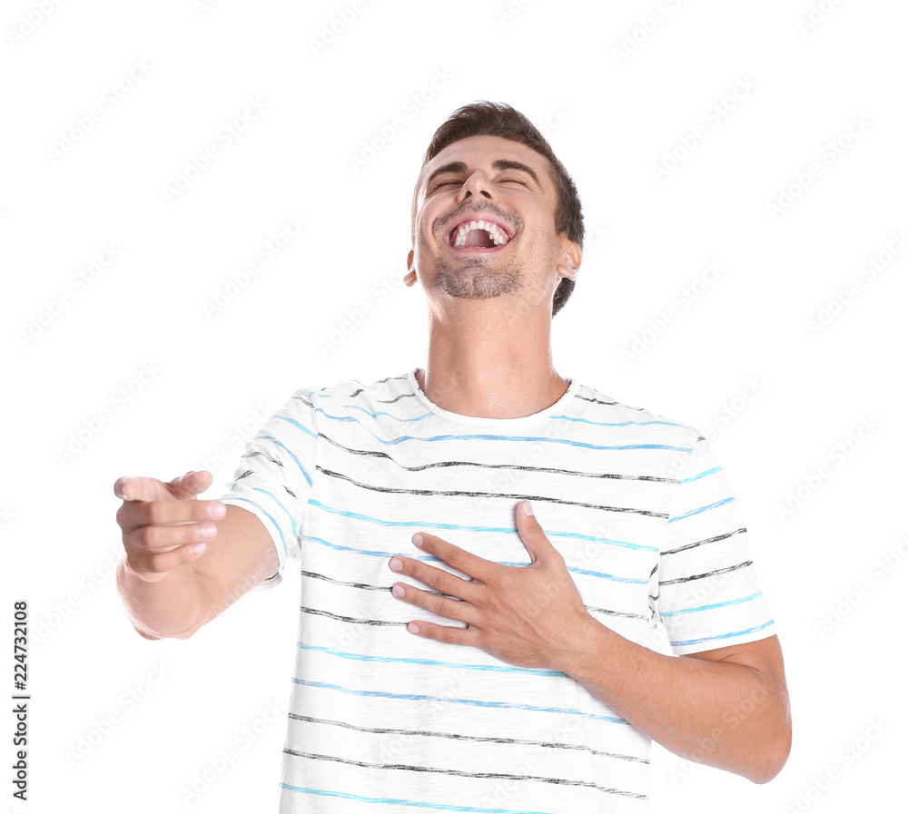 Portrait of handsome young man laughing on white background Portrait of handsome young man laughing on white background