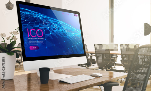 computer with ico initial coin offering  website screen on modern business office mockup photo