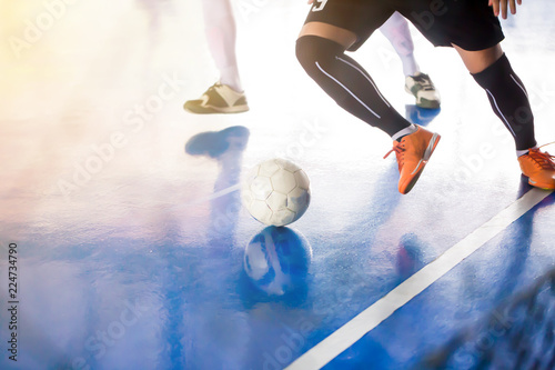 Indoor soccer sports hall. Football futsal player photo