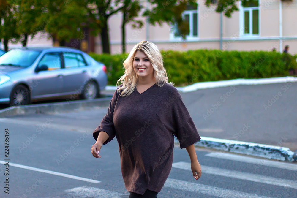 Fototapeta premium fat girl with a beautiful smile