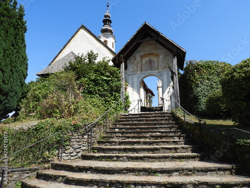 Stairway through entrance with church's yard.