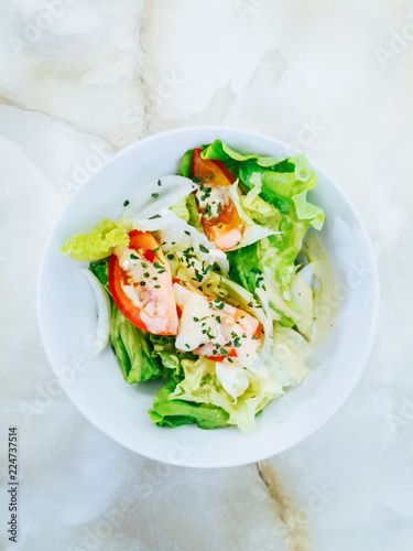 Delicious fresh salad and olive oil