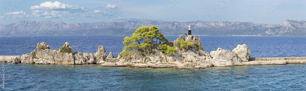 Croatia - The panorama with the statue of Virgin Mary in Trpanj on the Peliesac penisula.