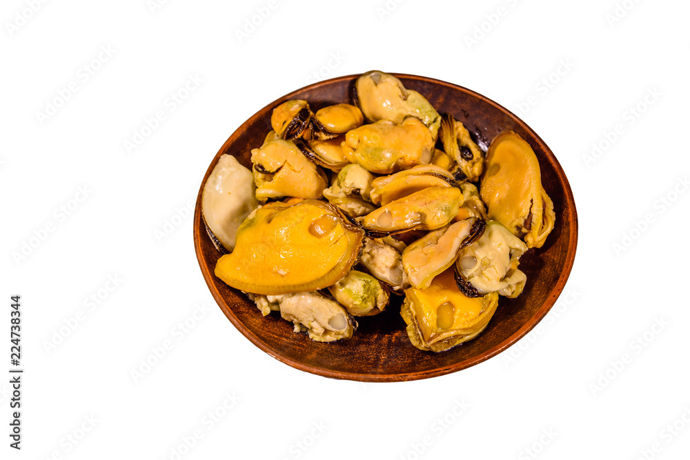 Ceramic plate with prepared mussels isolated on a white background Ceramic plate with prepared mussels isolated on a white background