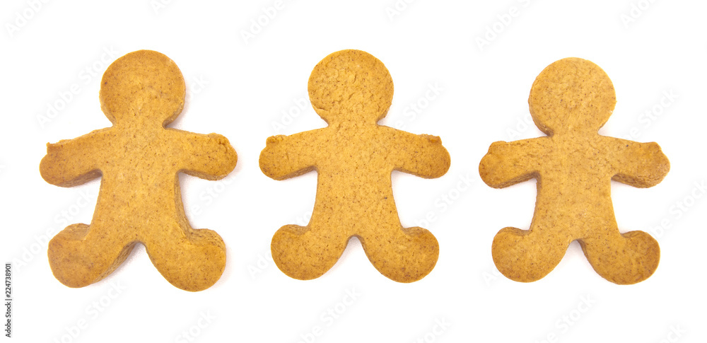 Undecorated Gingerbread People on a White Background Undecorated Gingerbread People on a White Background