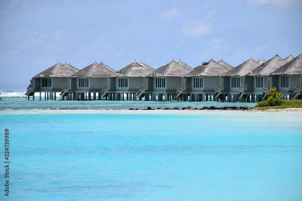 Over-water bungalows, in the turquoise waters of the Indian Ocean, maldives Over-water bungalows, in the turquoise waters of the Indian Ocean, maldives