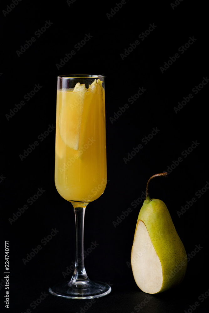 Cocktail italian pear on the dark background Cocktail italian pear on the dark background