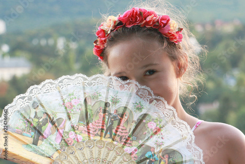 Girl with spanish fan