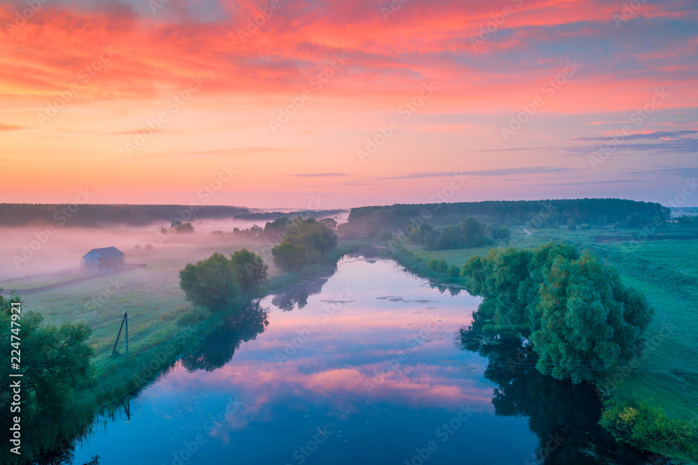 Early in the morning, sunrise over the river. Rural landscape. Beautiful nature