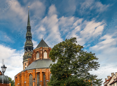 The medieval Evangelical Lutheran church of St. Peter in old Riga (Latvia) is one of the oldest and highest buildings in Baltic region, Europe photo