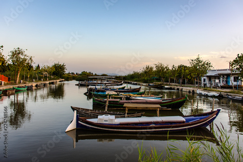 Fototapeta Naklejka Na Ścianę i Meble -  Rice boats anchored in a small harbour