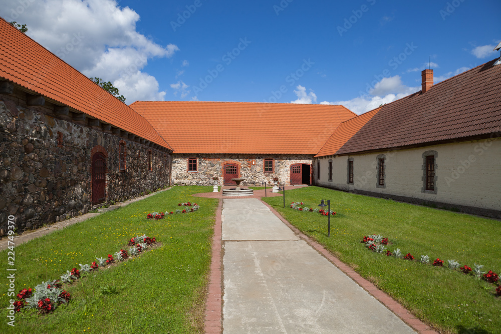 Cortyard of Cantervilla castle in Estonia. Restored traditional Nothern European architecture. Cortyard of Cantervilla castle in Estonia. Restored traditional Nothern European architecture.