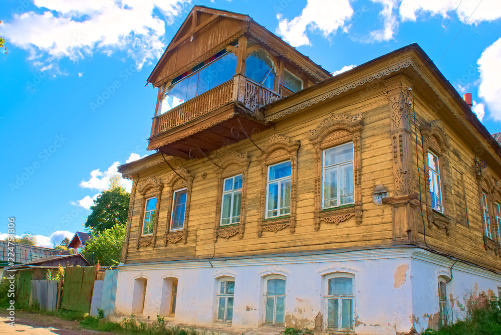 An old traditional brick-wooden house. Kostroma, Russia.