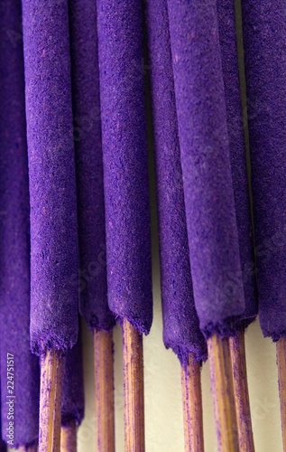 Purple incense sticks in macro view