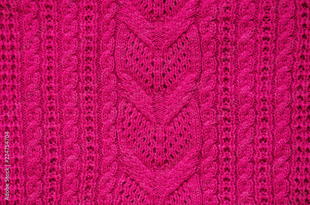 Pink knitted sweater texture background