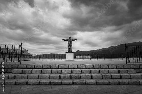 Christ de la Place de l'Eglise Notre Dame de Misericorde, Propiano, Corse, France photo