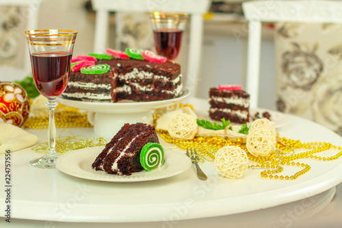 glass of red wine and a cake. Top view. food background copy space photo