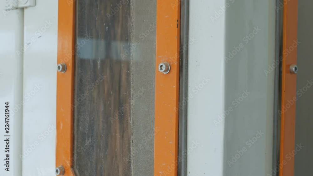 Purified wheat grains fall into the modern automated mill Purified wheat grains fall into the modern automated mill