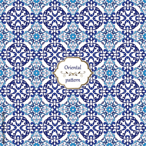 Oriental seamless traditional pattern in indigo color. Seamless patchwork pattern tiles from Morocco, Portugal in blue colors. Decorative ornament can be used for wallpaper, backdrop, fabric, textile.