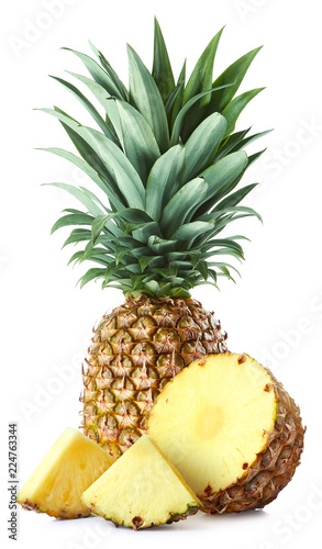 Fresh whole and sliced pineapple