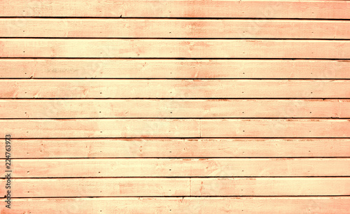 Texture of a fragment of a wooden house wall. 