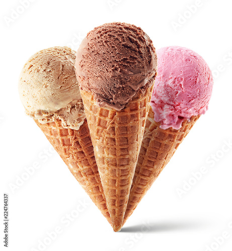 Chocolate, strawberry and caramel ice cream with cone