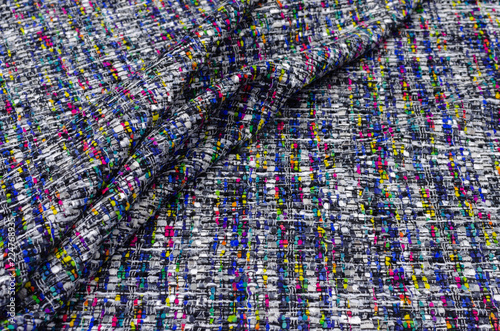Tweed fabric with bright patches on black and white