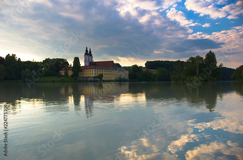 A view at Vornbach Abbey (Kloster Vornbach - Kirche Maria Himmelfahrt) over river Inn during the sunset