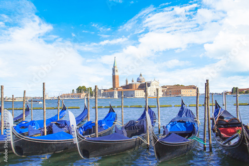 Beautiful view of the gondolas and the Cathedral of San Giorgio Maggiore, on an island in the Venetian lagoon, Venice, Italy