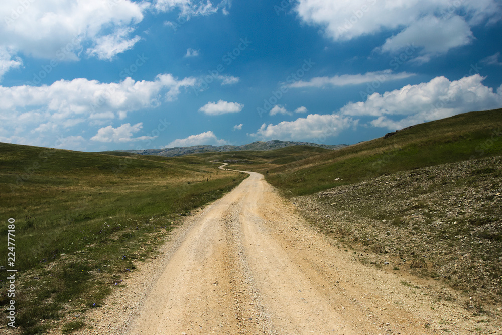 An empty winding route through the Zelengora mountain range near Kalinovik, Bosnia and Herzegovina.