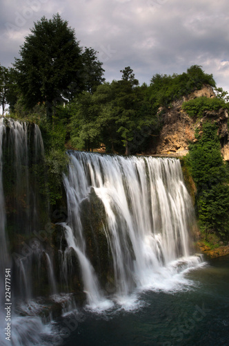 A detailed  view at Pliva waterfall  Plivski vodopad  located in the city center of Jajce  Bosnia and Herzegovina.