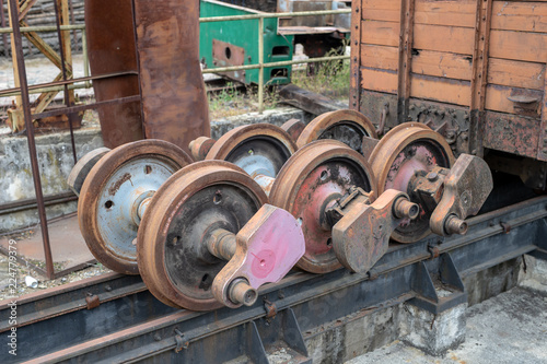 Old workshop of wagons and narrow-gauge railway locomotives. Place of repair and renovation for trains. photo