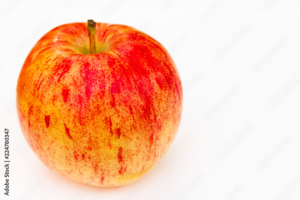 bright ripe juicy apple isolated on white background. healthy diet nutrition wallpaper. bright ripe juicy apple isolated on white background. healthy diet nutrition wallpaper.