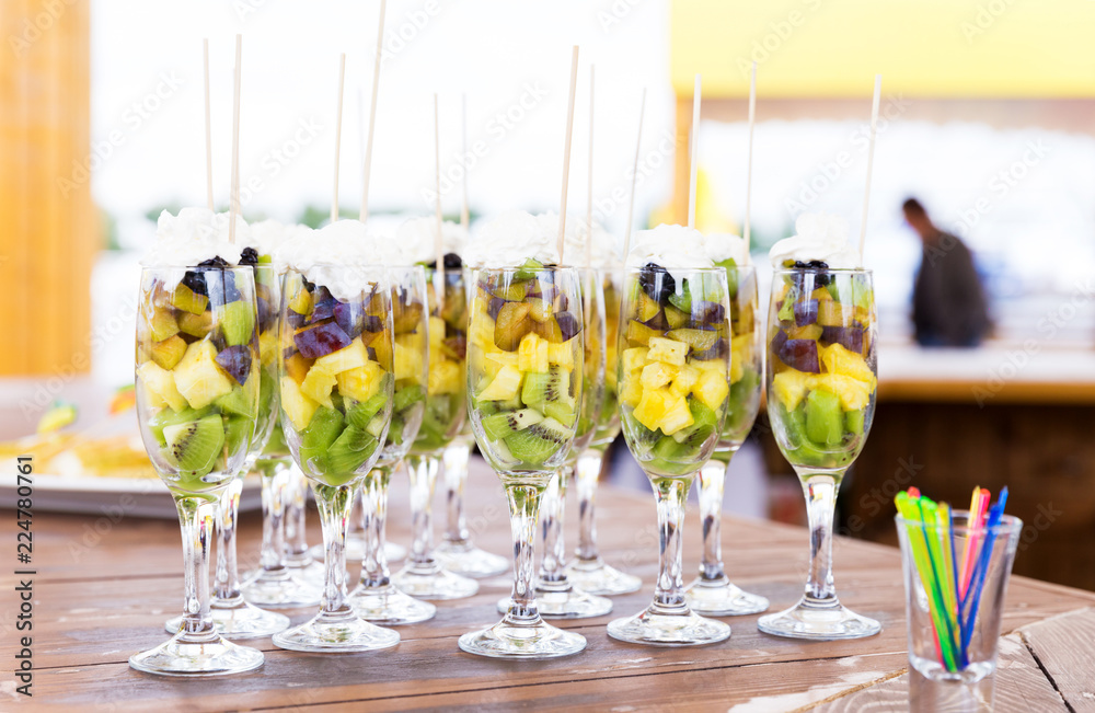 Cuts of fruits in glasses for party