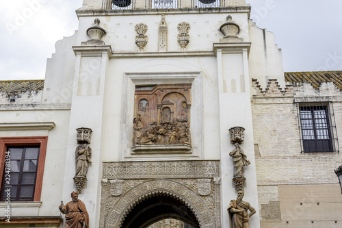 facade of the door of the forgiveness in the entrance of the cathedral of Seville, Andalucia, Spain.