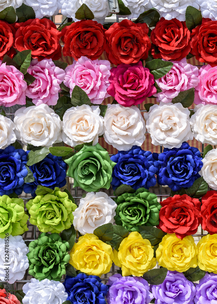 background of flowers of different colored papers
